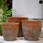 Urban Trends Ceramic Short Wide Round Flower Pot Set of Three Washed Finish Vermilion..7.75"x7.75"x7.00"H; 6.50"x6.50"x6.00"H; 5.50"x5.50"x5.00"H - Image 3