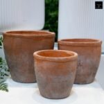Urban Trends Ceramic Short Wide Round Flower Pot Set of Three Washed Finish Vermilion..7.75"x7.75"x7.00"H; 6.50"x6.50"x6.00"H; 5.50"x5.50"x5.00"H - Image 8
