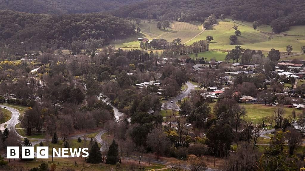 Shock, sadness and relief in town at centre of Australia's seven-month police manhunt
