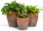 Urban Trends Ceramic Short Wide Round Flower Pot Set of Three Washed Finish Vermilion..7.75"x7.75"x7.00"H; 6.50"x6.50"x6.00"H; 5.50"x5.50"x5.00"H - Image 2