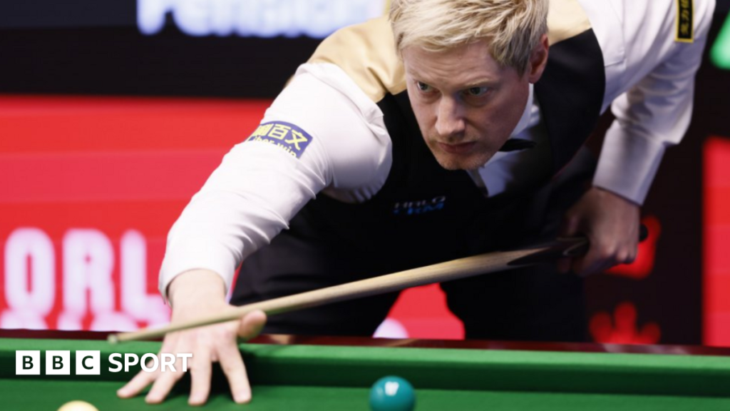 Neil Robertson takes a shot