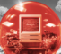 A surreal digital collage featuring a vintage Macintosh SE inside a large, glowing red bubble. The computer screen displays the word “design.” over lines of code. Floating floppy disks and a small bonsai tree surround the monitor within the sphere. The background is a grainy, black-and-white landscape with sparse trees and a solitary figure seated in the distance, blending retro-tech nostalgia with a dreamlike, futuristic atmosphere.
