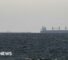 Iran says Strait of Hormuz is 'open' but tracking shows few ships moving