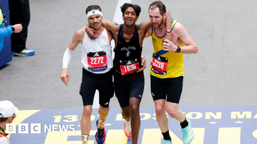 Runners help exhausted man finish Boston Marathon