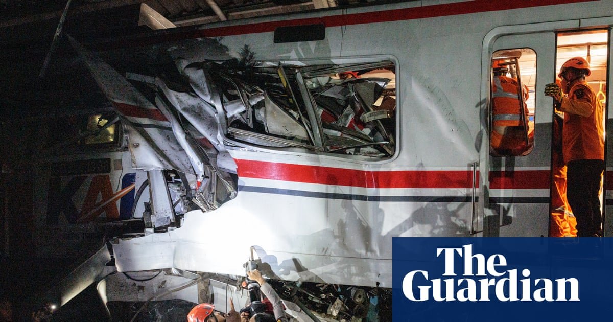 Train collision in Indonesia kills seven as rescuers work to reach survivors | Indonesia