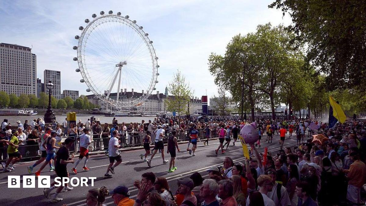 London Marathon runners with the London Eye in the background