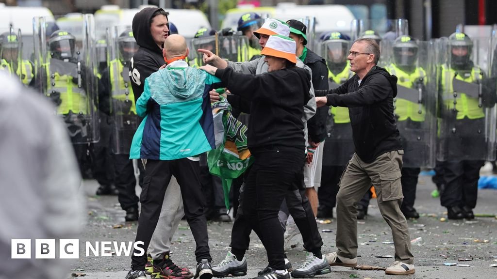 Riot police deal with 'serious disorder' as Celtic fans celebrate Premiership title win