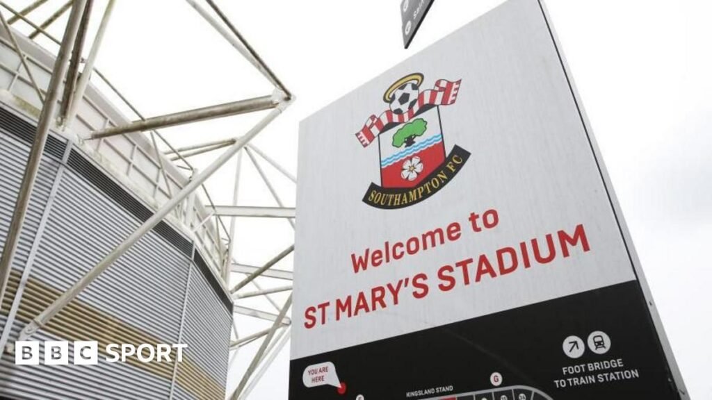A general view of a sign showing Southampton's badge outside St Mary's Stadium