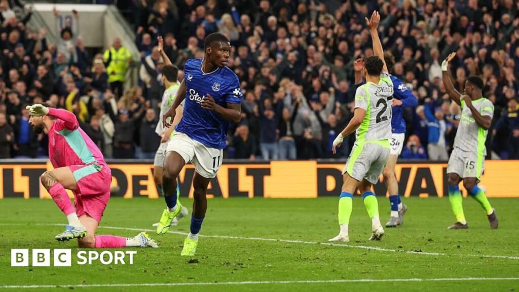 Everton's Thierno Barry celebrates scoring his side's second goal as Manchester City players appeal for offside