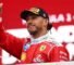 Lewis Hamilton gives a thumbs up on the podium in Canada