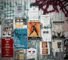 Photograph of a wall with assorted handmade and amateur flyers